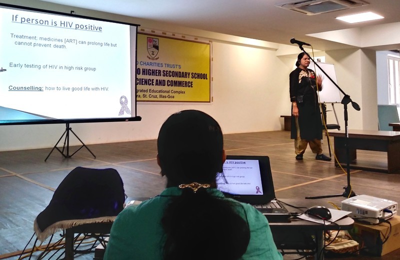 Teacher in charge of Red Ribbon Club, Mrs. Shubhada Bandodkar highlighting different aspects of HIV/AIDS.